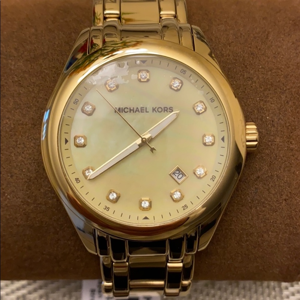 Gold tone Michael Kors watch